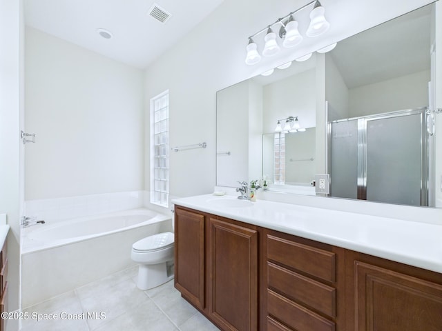 3531 Plume Way SE, Palm Bay, FL 32909 - bathroom with vanity, tile patterned floors, a garden tub, and a stall shower