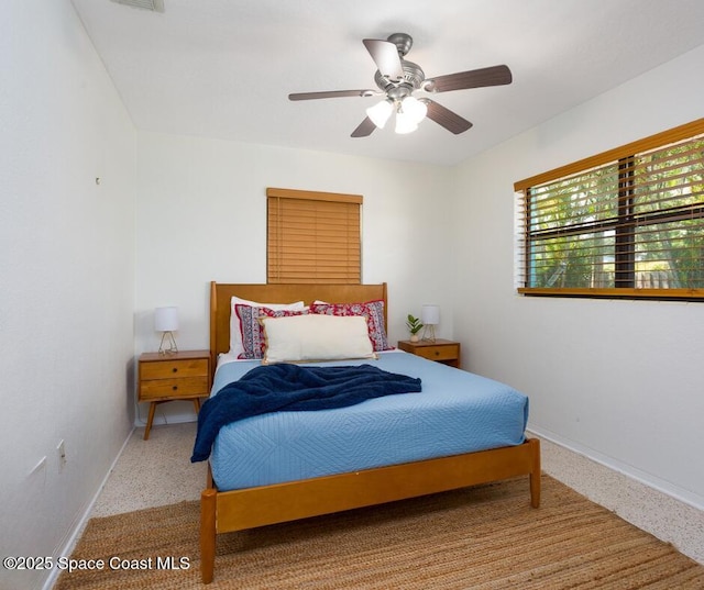 936 Santa Cruz Rd, Cocoa Beach, FL 32931 - bedroom with baseboards and a ceiling fan