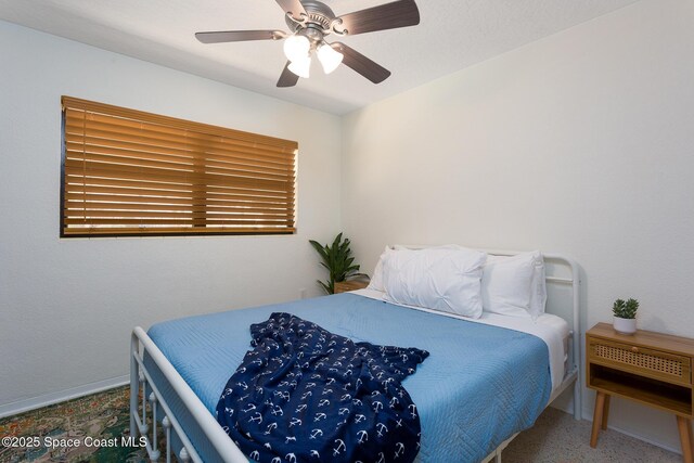 936 Santa Cruz Rd, Cocoa Beach, FL 32931 - bedroom with baseboards and a ceiling fan