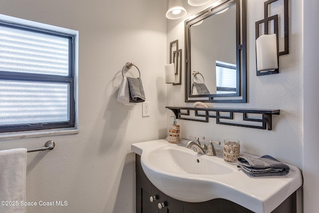 936 Santa Cruz Rd, Cocoa Beach, FL 32931 - bathroom featuring vanity and healthy amount of natural light