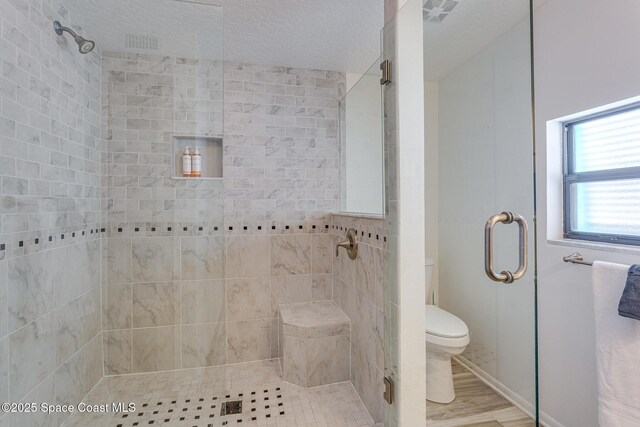 936 Santa Cruz Rd, Cocoa Beach, FL 32931 - bathroom with a stall shower and toilet