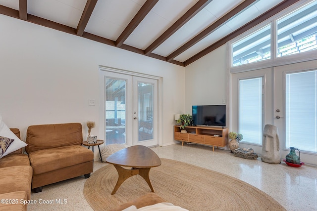 936 Santa Cruz Rd, Cocoa Beach, FL 32931 - living area featuring french doors, speckle patterned floor, and plenty of natural light