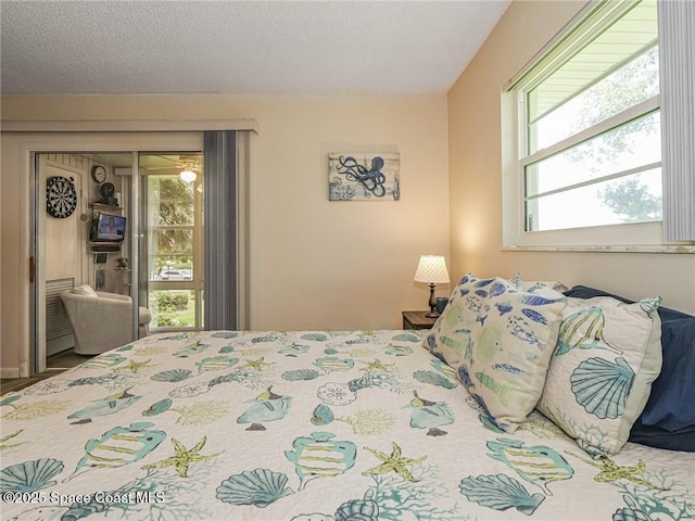 26 Pine Arbor Ln Unit 205, Vero Beach, FL 32962 - bedroom with a textured ceiling
