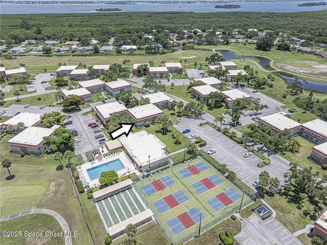 26 Pine Arbor Ln Unit 205, Vero Beach, FL 32962 - bird's eye view of a large body of water and a pool