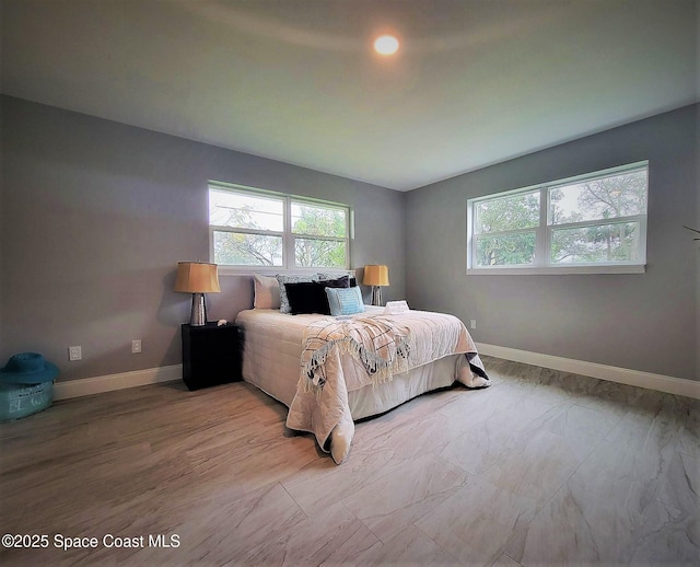 2309 Dairy Rd, Melbourne, FL 32904 - bedroom featuring multiple windows