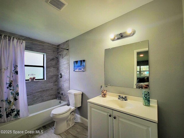 2309 Dairy Rd, Melbourne, FL 32904 - bathroom with shower / tub combo and vanity