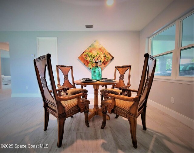 2309 Dairy Rd, Melbourne, FL 32904 - dining room with wood finished floors