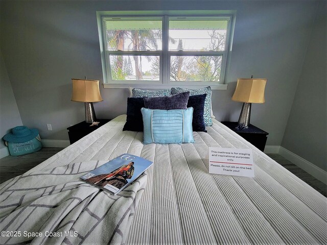 2309 Dairy Rd, Melbourne, FL 32904 - bedroom featuring baseboards