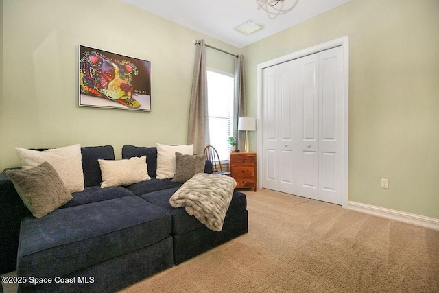 7354 Lucaya Ct, Melbourne, FL 32940 - carpeted living area featuring baseboards