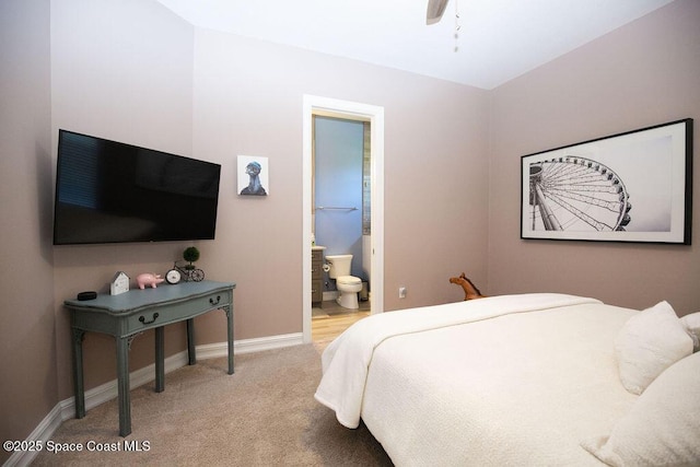 7354 Lucaya Ct, Melbourne, FL 32940 - bedroom with carpet flooring, ensuite bathroom, and ceiling fan