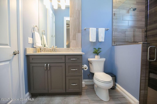 7354 Lucaya Ct, Melbourne, FL 32940 - full bath featuring vanity, a stall shower, and wood finished floors