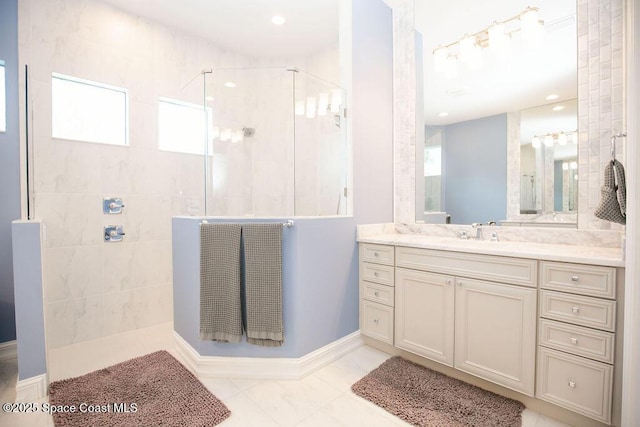 7354 Lucaya Ct, Melbourne, FL 32940 - full bath featuring a walk in shower, vanity, healthy amount of natural light, marble finish flooring, and recessed lighting