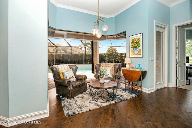 7354 Lucaya Ct, Melbourne, FL 32940 - living area with ornamental molding, wood-type flooring, and a sunroom
