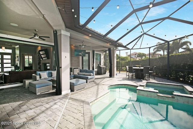 7354 Lucaya Ct, Melbourne, FL 32940 - view of swimming pool with ceiling fan, a patio, an outdoor living space, a pool with connected hot tub, and outdoor dining space