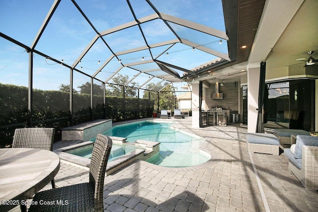 7354 Lucaya Ct, Melbourne, FL 32940 - view of swimming pool with a patio area, a pool with connected hot tub, area for grilling, a lanai, and a ceiling fan