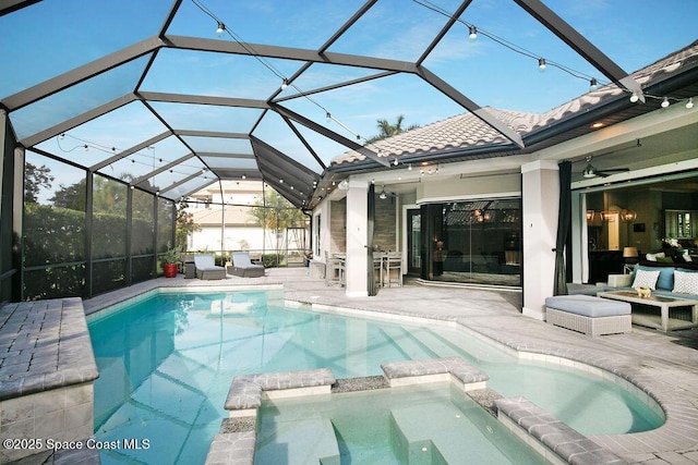 7354 Lucaya Ct, Melbourne, FL 32940 - view of pool featuring a patio, a pool with connected hot tub, an outdoor living space, and glass enclosure