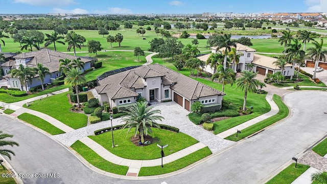 7354 Lucaya Ct, Melbourne, FL 32940 - aerial view of residential area with a golf course and a nearby body of water
