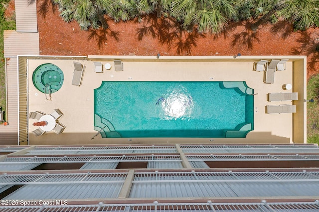 225 N Atlantic Ave Unit 603, Cocoa Beach, FL 32931 - bird's eye view of a pool