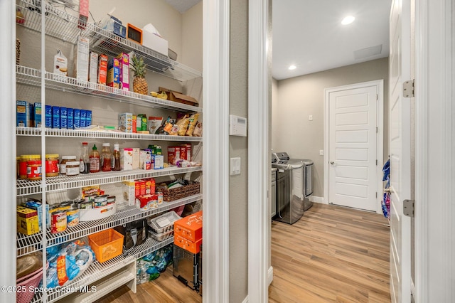 4554 Preservation Cir, Melbourne, FL 32934 - storage area featuring separate washer and dryer