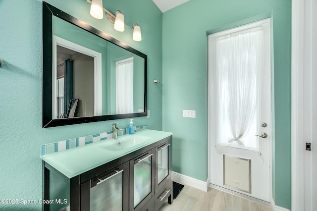 4554 Preservation Cir, Melbourne, FL 32934 - bathroom featuring vanity and wood finished floors