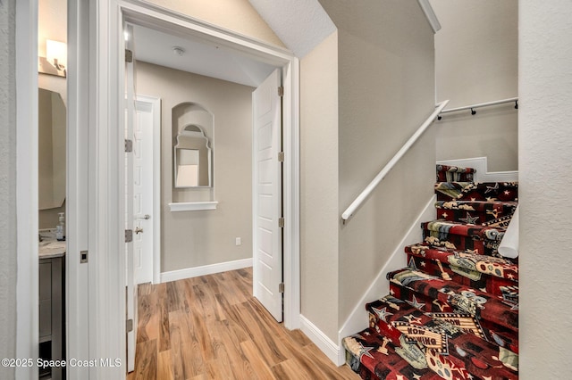 4554 Preservation Cir, Melbourne, FL 32934 - corridor with wood finished floors and baseboards