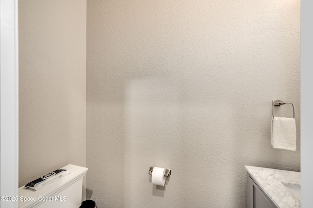 4554 Preservation Cir, Melbourne, FL 32934 - bathroom featuring toilet and vanity