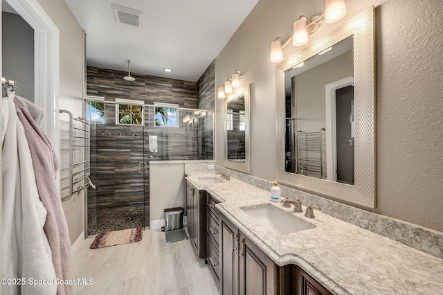 4554 Preservation Cir, Melbourne, FL 32934 - full bathroom with double vanity and a shower stall