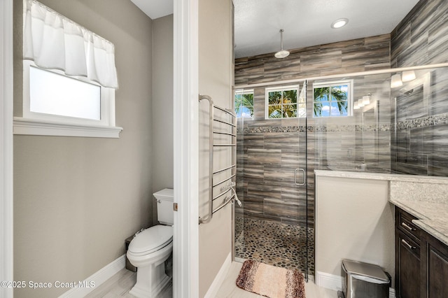 4554 Preservation Cir, Melbourne, FL 32934 - bathroom featuring a shower stall, vanity, and recessed lighting