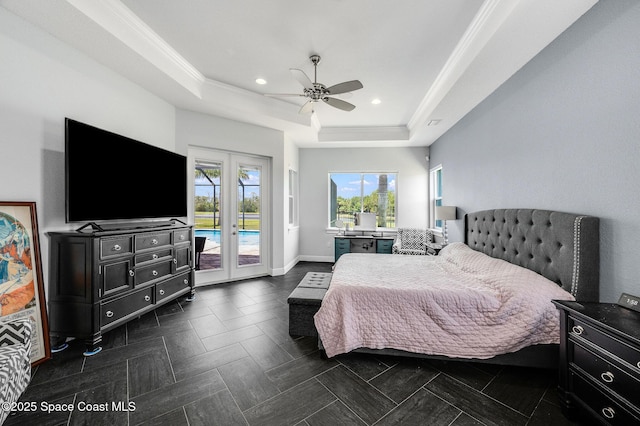4554 Preservation Cir, Melbourne, FL 32934 - bedroom featuring french doors, access to exterior, a raised ceiling, a ceiling fan, and recessed lighting