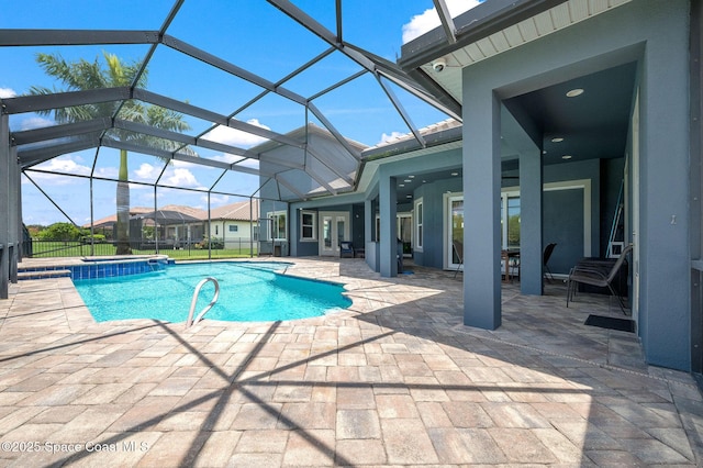 4554 Preservation Cir, Melbourne, FL 32934 - view of pool featuring a patio area, a pool with connected hot tub, and glass enclosure