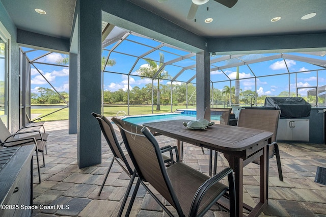 4554 Preservation Cir, Melbourne, FL 32934 - view of patio / terrace with a grill, ceiling fan, an outdoor pool, and glass enclosure