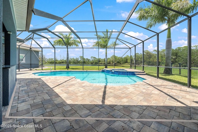 4554 Preservation Cir, Melbourne, FL 32934 - view of pool featuring a patio area, a pool with connected hot tub, glass enclosure, and a lawn