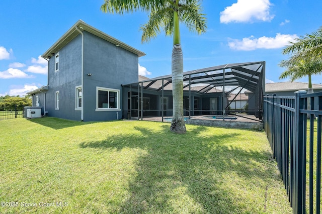 4554 Preservation Cir, Melbourne, FL 32934 - rear view of property featuring a fenced backyard, stucco siding, an outdoor pool, and a lanai
