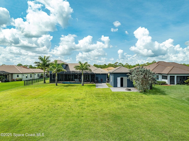 4554 Preservation Cir, Melbourne, FL 32934 - view of grassy yard with a patio and a residential view