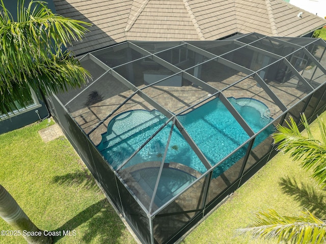 4554 Preservation Cir, Melbourne, FL 32934 - swimming pool featuring a lanai, a patio, and a yard