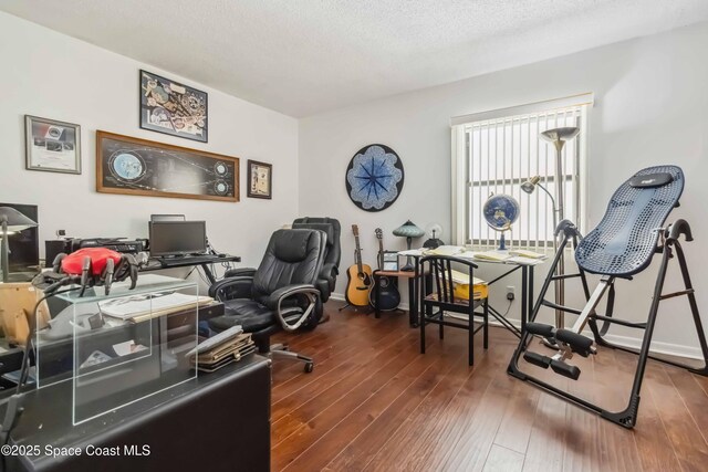 750 N Atlantic Ave Unit 203, Cocoa Beach, FL 32931 - office space featuring wood-type flooring and a textured ceiling