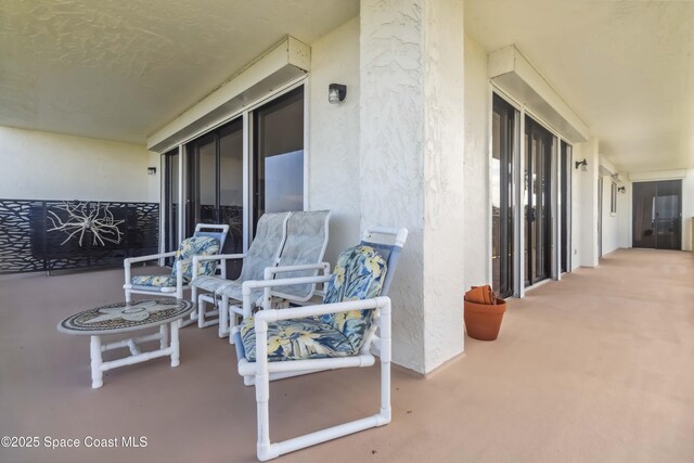 750 N Atlantic Ave Unit 203, Cocoa Beach, FL 32931 - view of patio / terrace