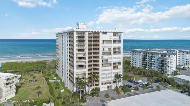 750 N Atlantic Ave Unit 203, Cocoa Beach, FL 32931 - view of apartment building / complex with a water view