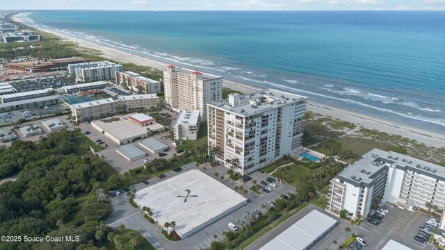 750 N Atlantic Ave Unit 203, Cocoa Beach, FL 32931 - bird's eye view of unending shoreline and apartment complex