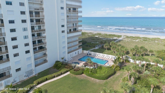 750 N Atlantic Ave Unit 203, Cocoa Beach, FL 32931 - drone / aerial view of apartment complex and waterfront with a beach