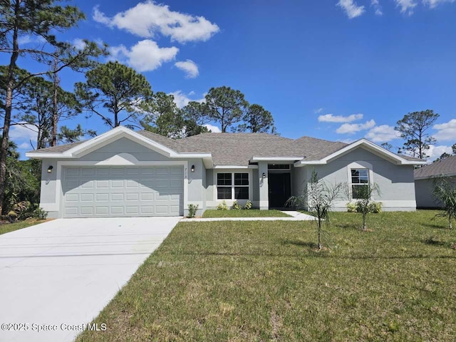 1101 Hanson Ave SW, Palm Bay, FL 32908 - ranch-style home with a garage, stucco siding, a front lawn, and concrete driveway