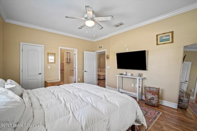 2097 Hidden Grove Ln Unit 106, Merritt Island, FL 32953 - bedroom with wood finished floors, crown molding, ensuite bathroom, and a ceiling fan
