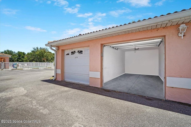 2097 Hidden Grove Ln Unit 106, Merritt Island, FL 32953 - view of garage