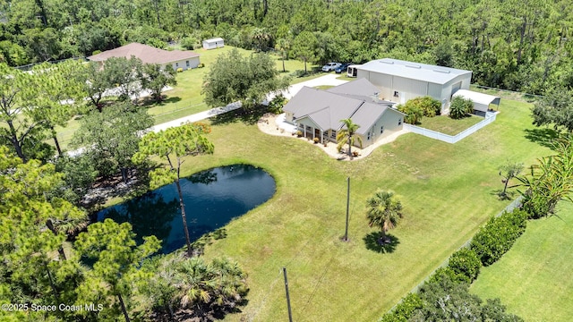 690 Grant Rd, Palm Bay, FL 32909 - view of subject property featuring a nearby body of water and a forest