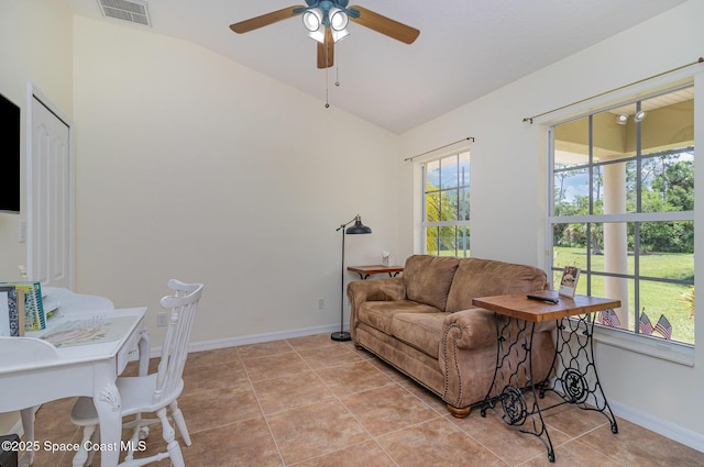 690 Grant Rd, Palm Bay, FL 32909 - living room with vaulted ceiling, ceiling fan, and light tile patterned flooring