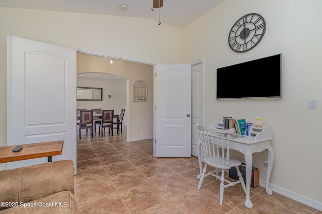 690 Grant Rd, Palm Bay, FL 32909 - living area featuring arched walkways, light tile patterned flooring, and lofted ceiling