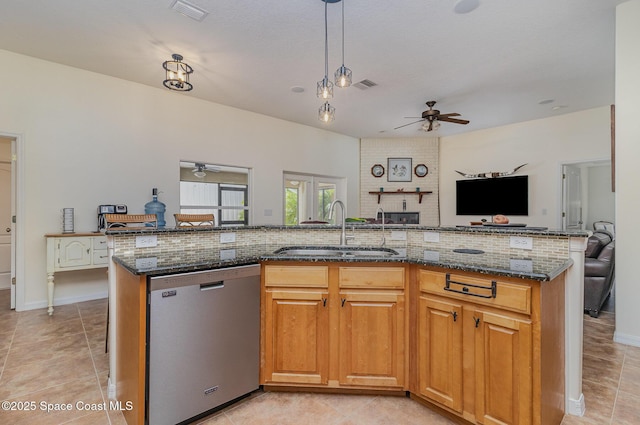 690 Grant Rd, Palm Bay, FL 32909 - kitchen with stainless steel dishwasher, a ceiling fan, open floor plan, and decorative backsplash