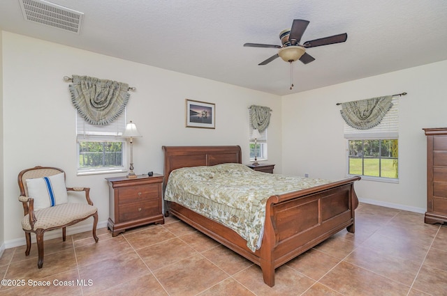 690 Grant Rd, Palm Bay, FL 32909 - bedroom featuring light tile patterned flooring and ceiling fan