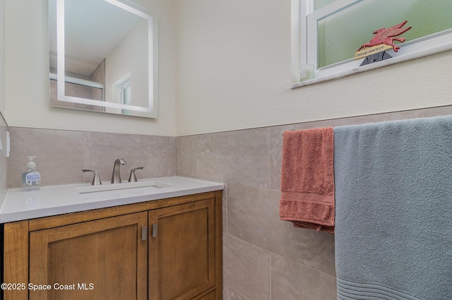 690 Grant Rd, Palm Bay, FL 32909 - bathroom featuring vanity and tile walls