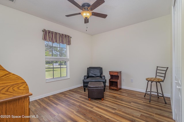 690 Grant Rd, Palm Bay, FL 32909 - living area featuring wood finished floors and a ceiling fan